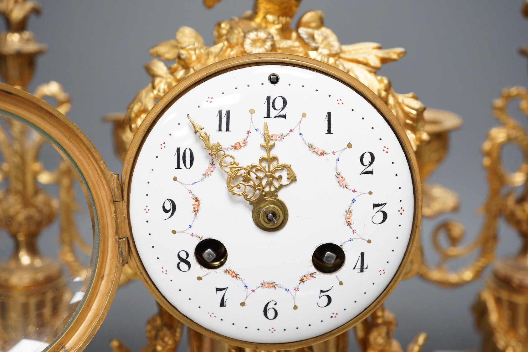 A French ormolu and alabaster clock garniture, 27cm